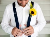 a white shirt, black suspenders and a bold sunflower boutonniere for a bright and inspiring summer groom’s look