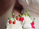 a cute and unusual summer wedding bouquet of white peonies and strawberries can be rocked for a summer wedding, you can make one yourself