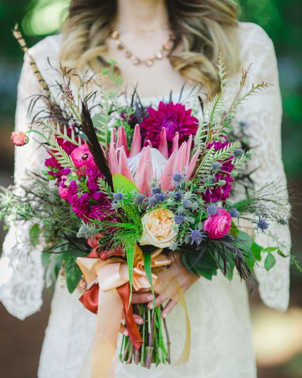 Textural wedding bouquets with feathers  11