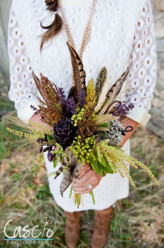 Textural wedding bouquets with feathers  22