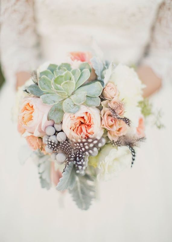 Textural wedding bouquets with feathers  5