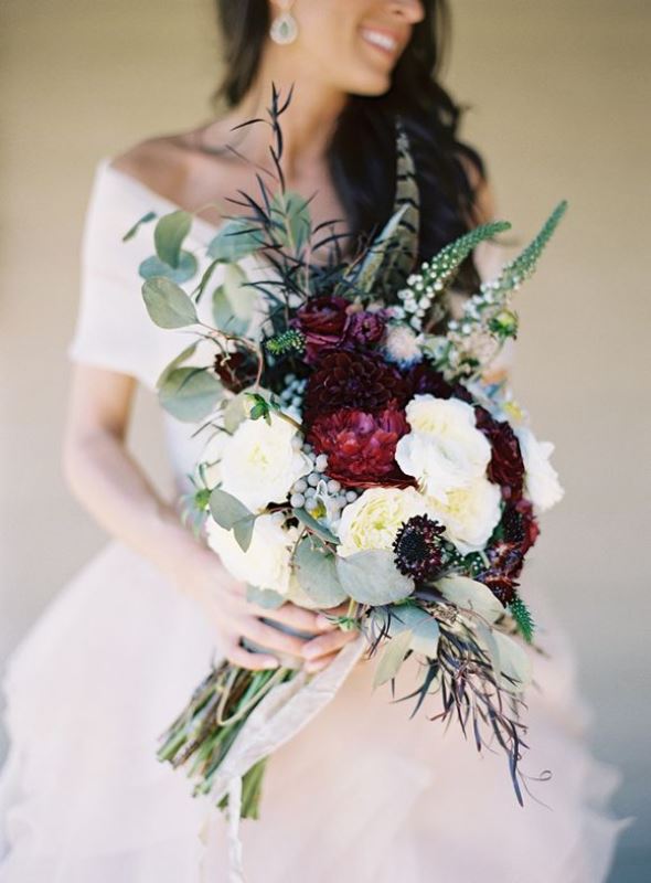 Textural wedding bouquets with feathers  6