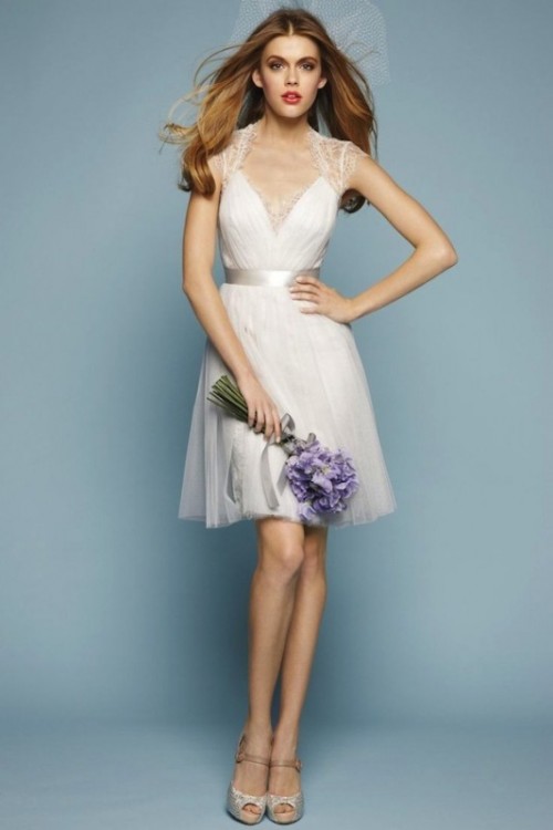 a neutral A-line mini dress with a draped bodice, lace cap sleeves and a pleated skirt is a dreamy and relaxed idea