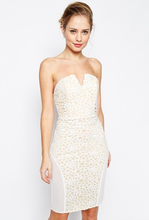 a textural white lace strapless mini dress with a small V-neckline is a very sexy and bold solution, add nude heels and go