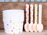 bright polka dot cans and bowls and wooden spoons for serving ice cream in a simple and comfortable way at the wedding