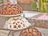 a three tiered stand with ice cream cones with chocolate is a lovely idea for a modern wedding – serve these cones and put ice cream into it