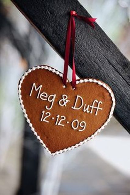 a heart-shaped gingerbread cookie with your wedding date and names is a lovely wedding decor idea or a wedding favor to DIY