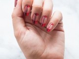 a catchy plaid manicure with pink, red, purple and tan are a stylish solution to go for
