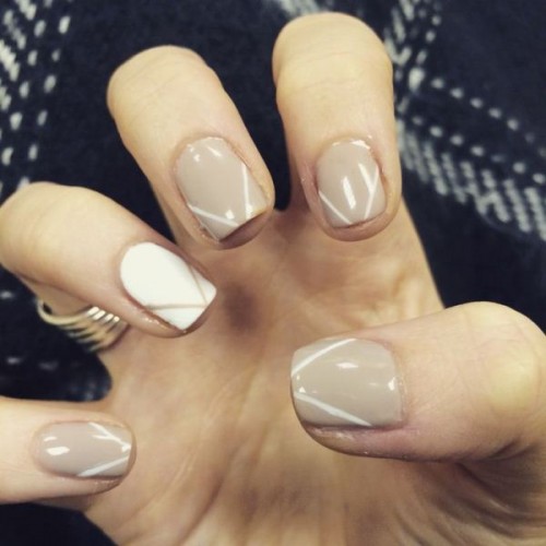 grey and white nails with geometric decor are neutral enough but have a special touch on them