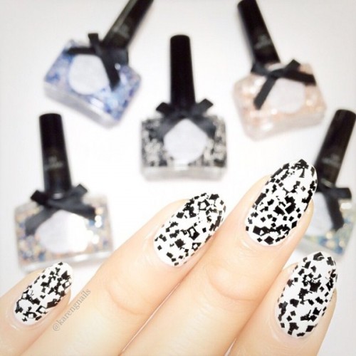 crazy white and black speckle nails are bold, cheerful and fun, these are classic colors but used in a creative way