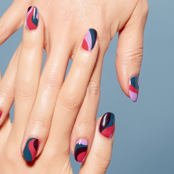 colorful abstract nails are a catchy way to bring much color to your look and a quirky pattern at the same time