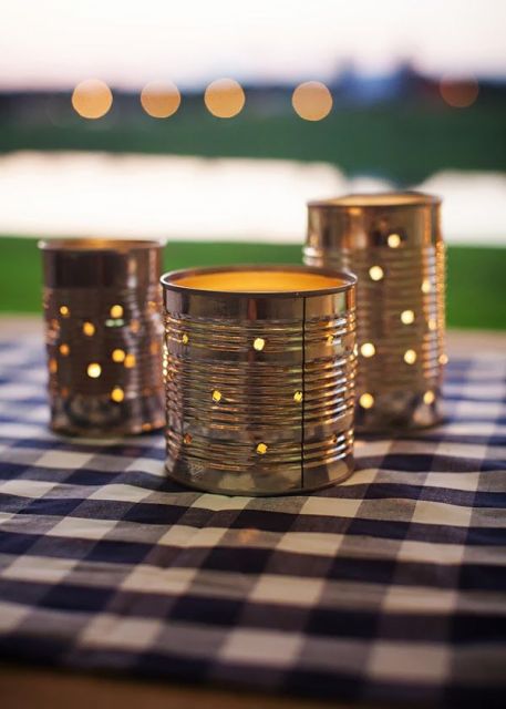 light up your rehearsal dinner with candle lanterns made of tin cans and it will look awesome and cozy