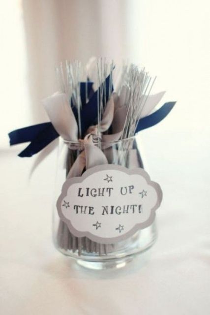 a jar with sparklers is a simple and cool way to offer your wedding guests some sparklers