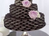 a cookie tower instead of a traditional wedding cake is a cool way to save some money and make the crowd pleased