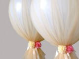 balloons covered with tulle, bright and neutral blooms for wedding cover