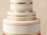 a white, blush and gold striped wedding cake is a chic and pretty idea for a modern glam wedding