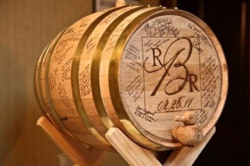 a wine barrel as a wedding guest book is a lovely idea - put it on a stand for more comfortable signing