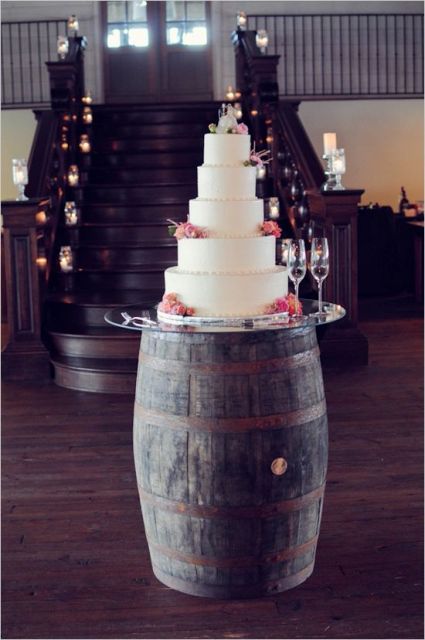 a barrel as a wedding cake stand is a pretty and easy idea that doesn't require any changes or hacks