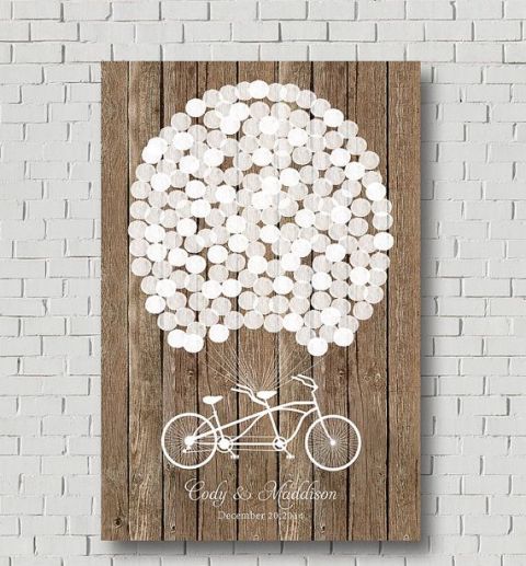 a wedding sign with a white bike and painted balloons can be used for decorating your venue and you can later decorate your home with it