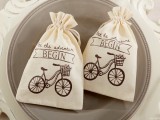 neutral sacks with bikes printed will give your wedding favors a lovely personalized feel easily