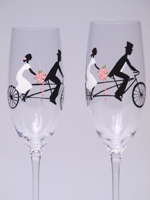 wedding flutes decorated with double bikes and a couple are amazing to show off your common hobby