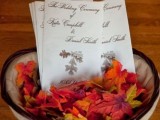 display your wedding programs or menus in fall leaves, which can be natura or faux and will make your space more fall-like