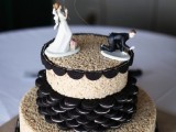 a krispie rice wedding cake with Oreos and funny sugar cake toppers is a creative modern idea