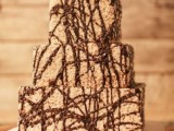 a square krispie rice wedding cake with chocolate drip is a fun modern idea to go for