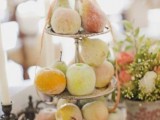 a stand with sugared fruit is a healthy alternative to usual wedding sweets, enjoy fresh fruit with delicious taste