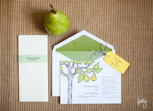 a white and green wedding invitation suite with pear prints is a simple and cute idea of a bold wedding suite for the fall