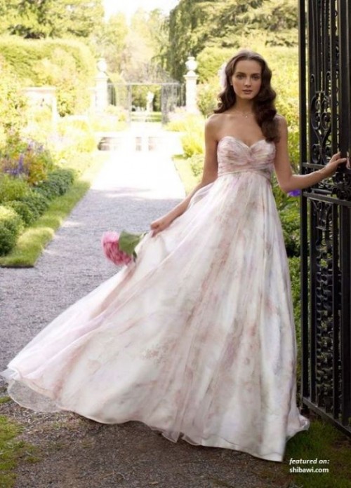 a strapless empire waist floral print wedding ballgown with a draped bodice is ideal for a spring or summer wedding