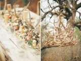 a gilded antler chandelier is a beautiful wedding venue decor idea to rock, it’s glam and very chic