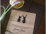 a plywood invitation with wood burnt letters and deer is a lovely and ccute idea for a woodland or just winter wedding