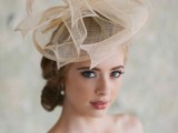 a creative tan semi sheer hat of a whimsical shape will finish off your exquisite bridal look, maybe in vintage style