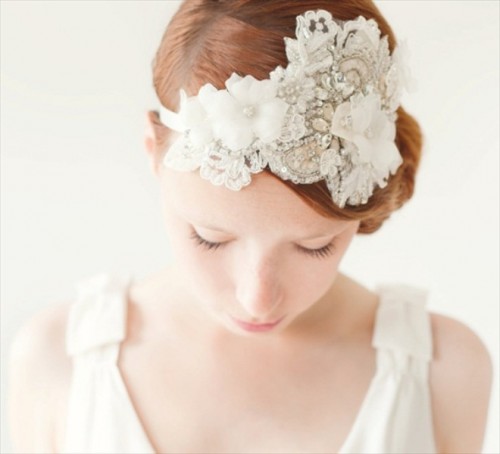 an embellished and white fabric flower headpiece will make your bridal look refined and vintage and will add chic to the outfit