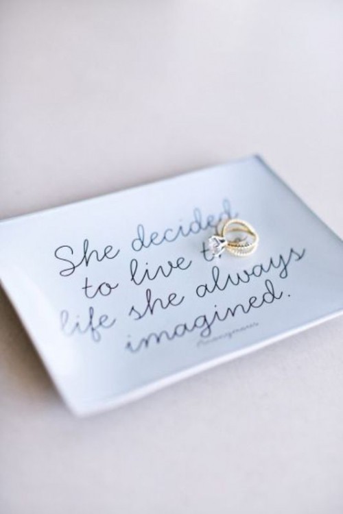 a white ring dish with a quote is a lovely idea for a modern wedding, you can DIY one easily
