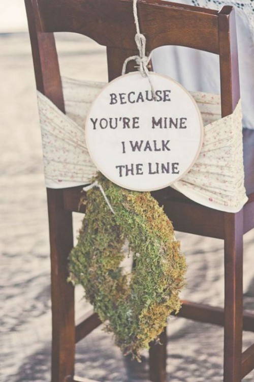 accent your wedding chairs with ribbon, a wreath and perhaps a wedding sign with a quote to make them more personalized