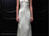 a fitting sleeveless embellished white silk wedding dress with a V-neckline for a glam look