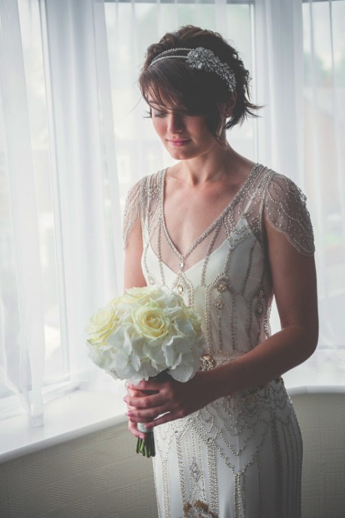 a gorgeous 1920s wedding dress with a slip plain gown and a fully embellished overdress for a romantic Gatsby look