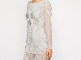 a glam Gatsby-inspired short wedding dress with full embellishments, long sleeves and an illusion skirt