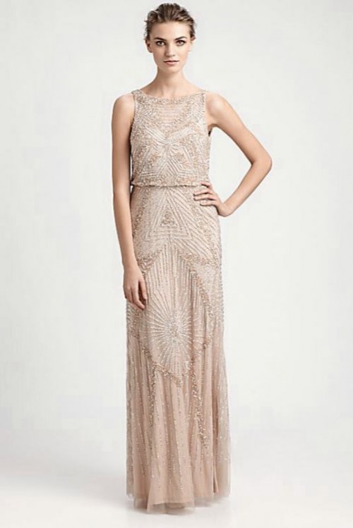 a sleeveless nude fitting fully embellished wedding dress with a high neckline