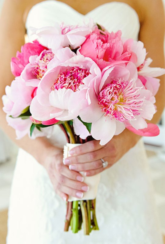 A blush and pink peony wedding bouquet is a lovely idea for a spring or summer wedding, it looks chic and beautiful