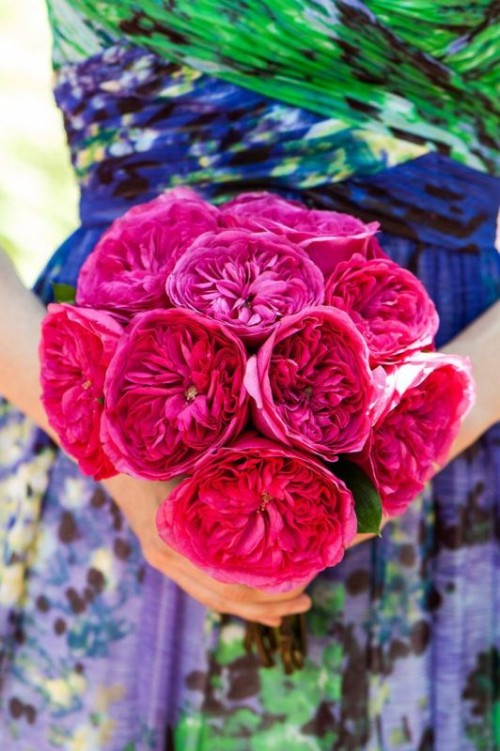 a hot pink wedding bouquet is a bold color touch to the wedding, it will make it catchier and more interesting