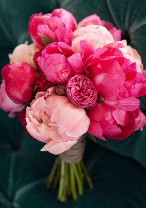 a light pink and fuchsia peony wedding bouquet is a gorgeous idea for a bold summer wedding, it looks wow