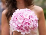 a light pink wedding bouquet is a simple, nice and cute idea for a spring or summer wedding, it looks chic and beautiful