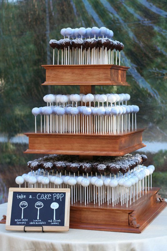 An assortment of cake pops on a stand is a great idea to substitute a usual wedding cake