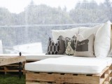 pallet furniture with upholstery and pillows is a budget-friendly and cool idea for your wedding lounge