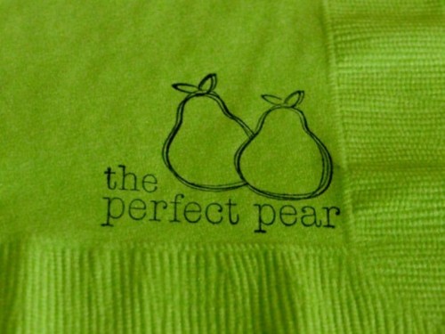 a lime green napkin with cute words printed will personalize your wedding reception table a lot