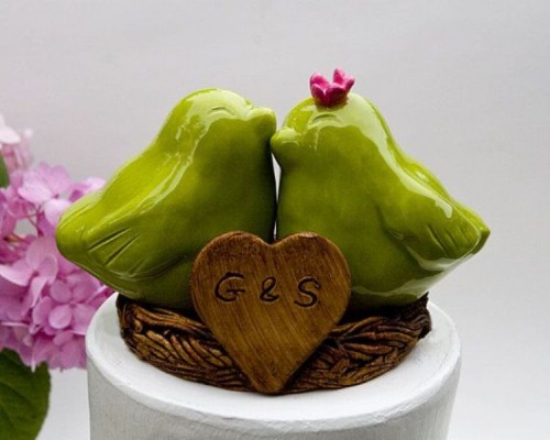 little green love birds like these ones can be used as wedding cake toppers or just as wedding decor