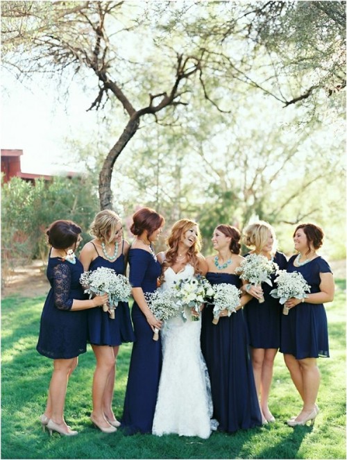 mismatching mini lace and plain bridesmaid dresses are great for a fall or winter wedding and look cute